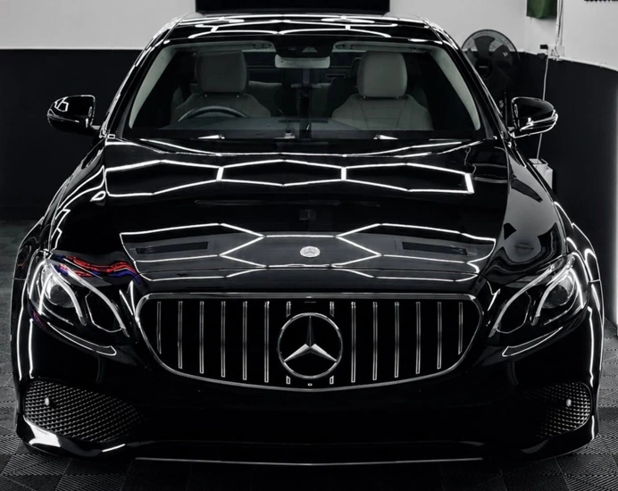 Black Mercedes inside Precision Garage