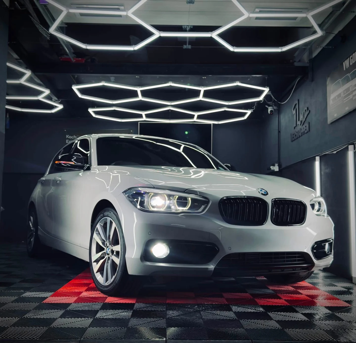 BMW under the workshop inspection lights